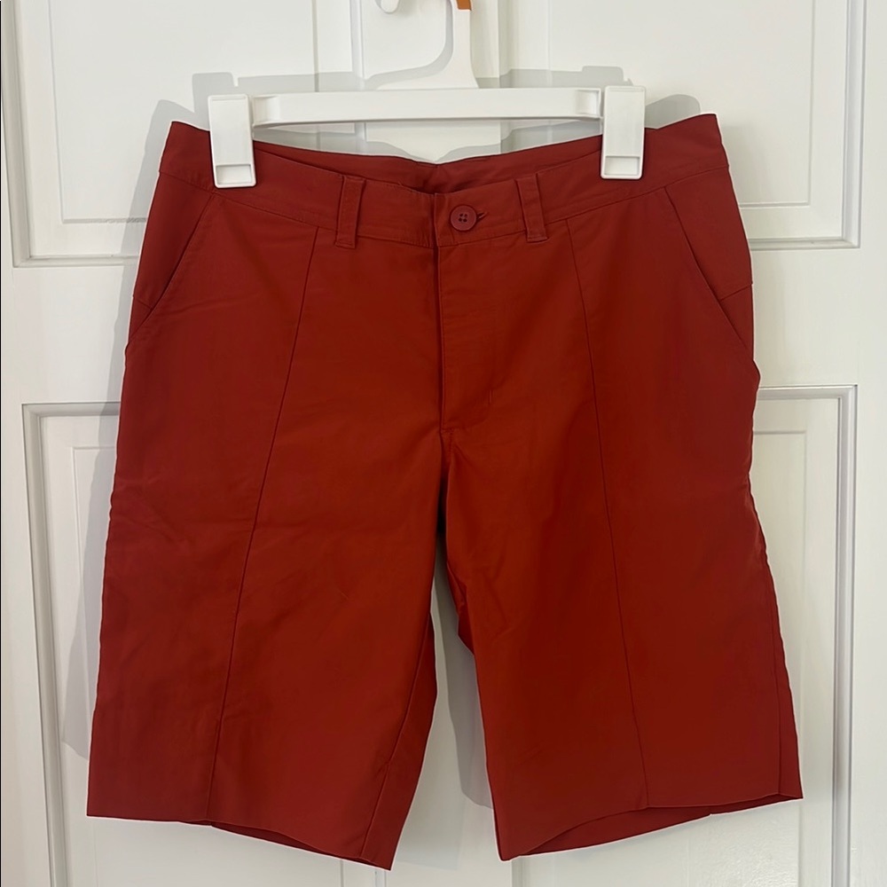 PATAGONIA women’s Flat-Front Performance Shorts- Rust/burnt orange